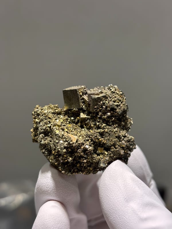 Brassy pyrite cubes on granular pyrite base from Hunan, China, second angle