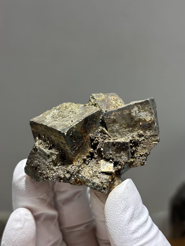 Cluster of pyrite cubes with mirror faces from Hubei, China, second angle