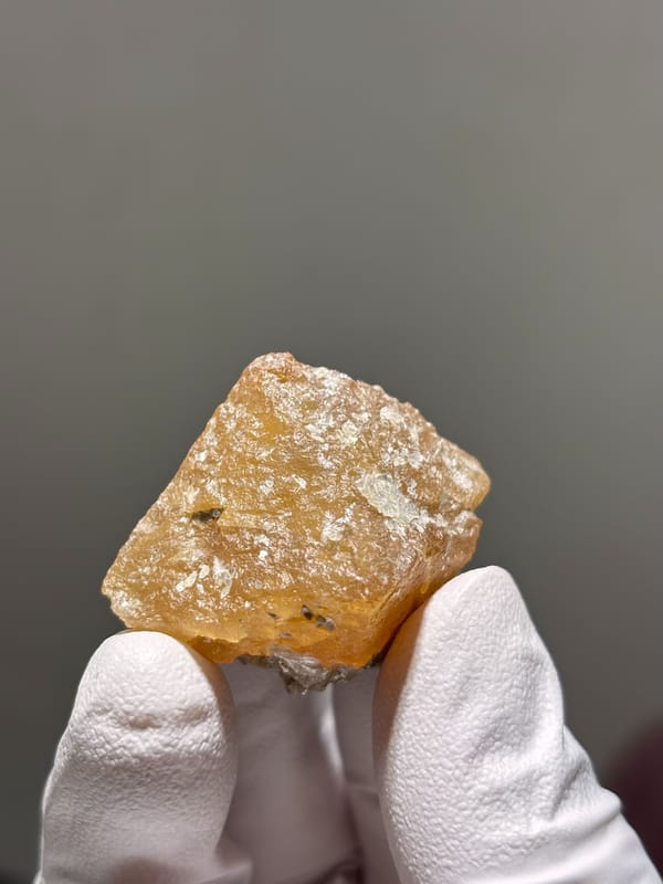 Etched honey scheelite crystal from Xuebaoding, Sichuan, China, second angle