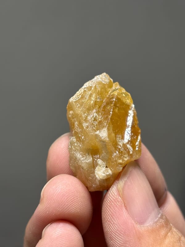 Golden-orange scheelite crystal from Xuebaoding, Sichuan, China, second angle
