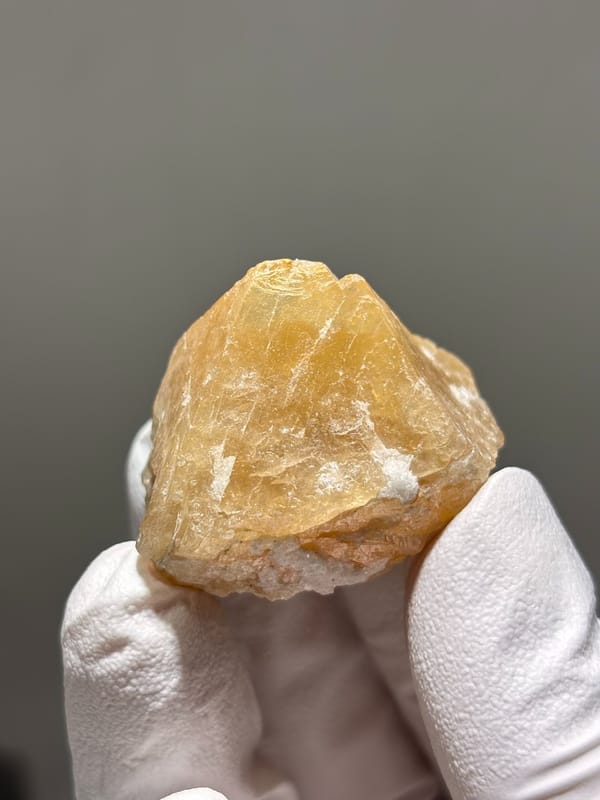 Honey scheelite with small fluorite from Xuebaoding, Sichuan, China, second angle