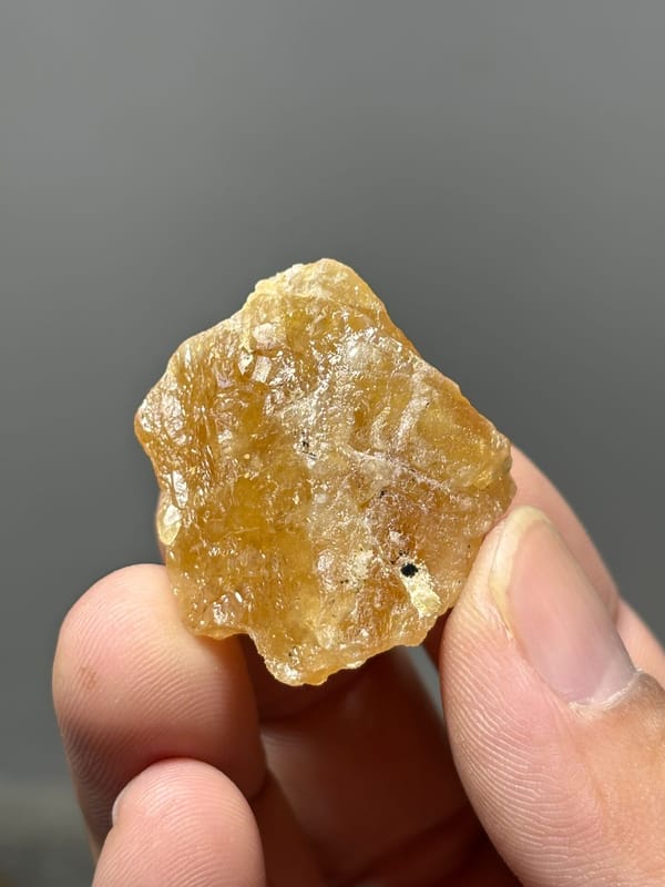 Honey-yellow scheelite crystal from Xuebaoding, Sichuan, China, second angle