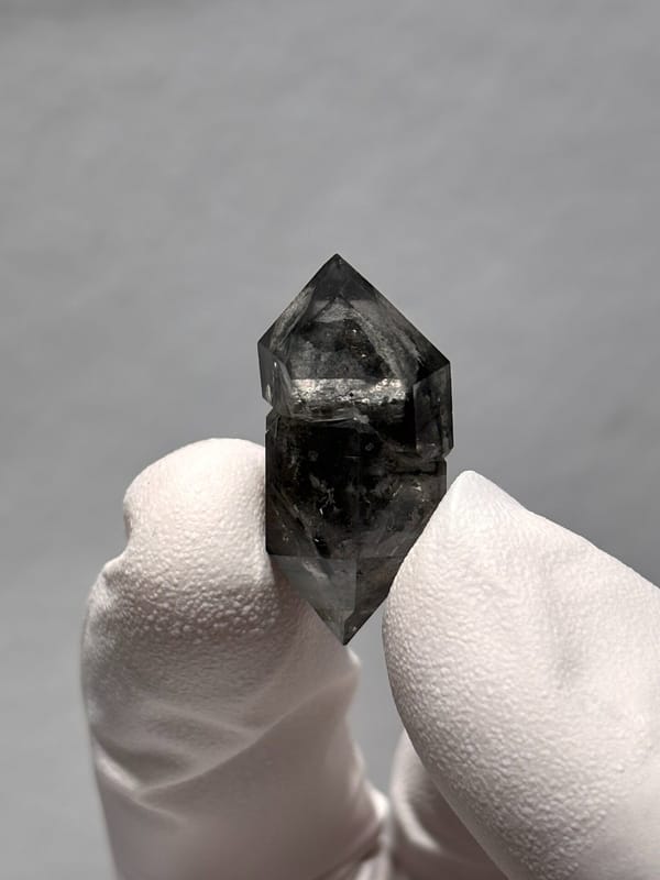 Stout black double-terminated quartz with clear cap from Yunnan, China, second angle