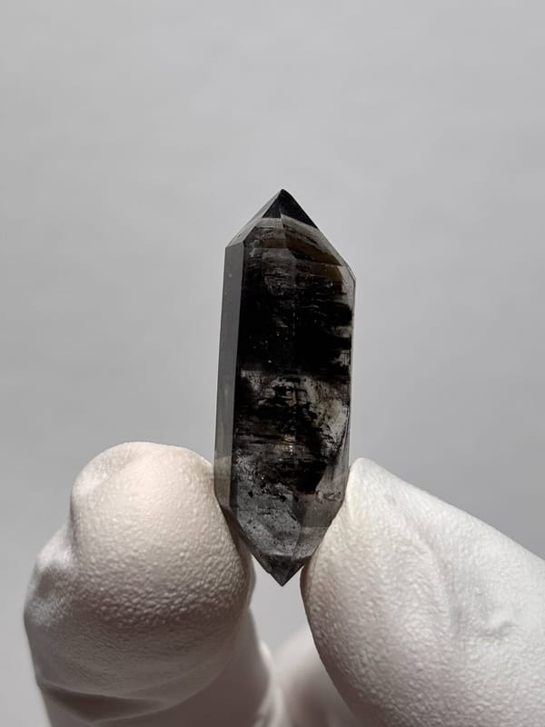 Black double-terminated quartz with clear tip from Yunnan, China, reverse side