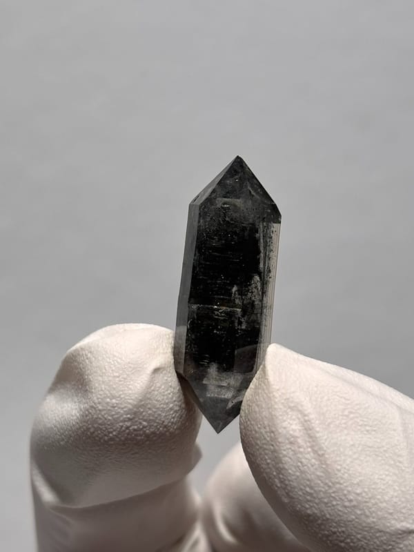 Black double-terminated quartz with clear rim from Yunnan, China, reverse side