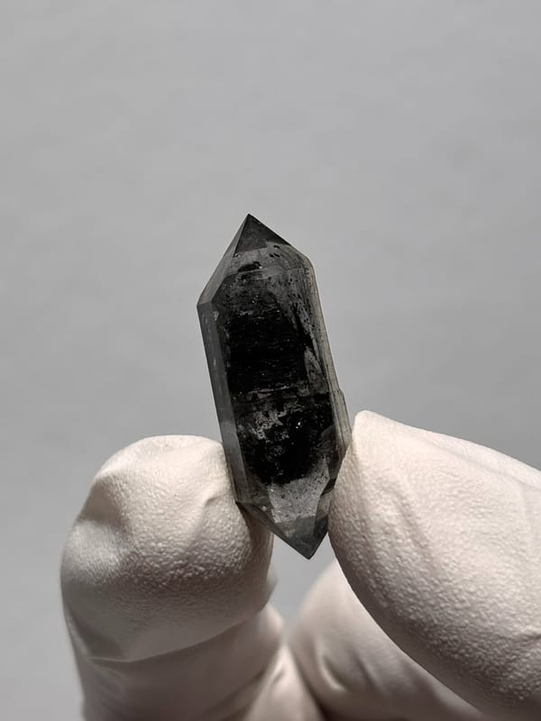 Black double-terminated quartz with clear rim from Yunnan, China, top view
