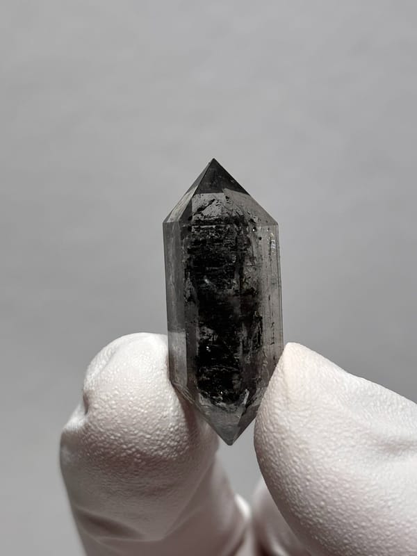 Black double-terminated quartz with clear rim from Yunnan, China, reverse side