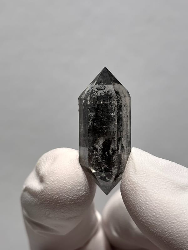 Black double-terminated quartz with clear rim from Yunnan, China, top view