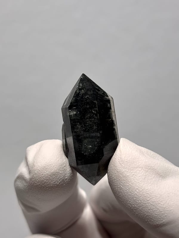Stout black double-terminated quartz with sparkles from Yunnan, China, second angle