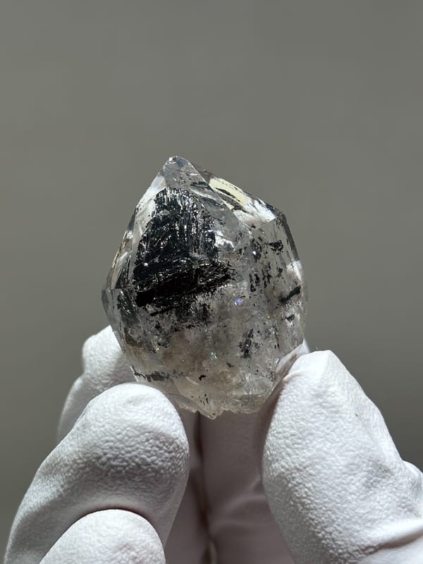Stout black quartz with floater base from Yunnan, China, detail of the matrix contact