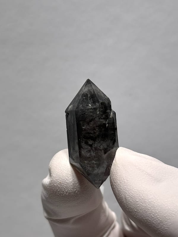 Stout black double-terminated quartz with sparkles from Yunnan, China, second angle