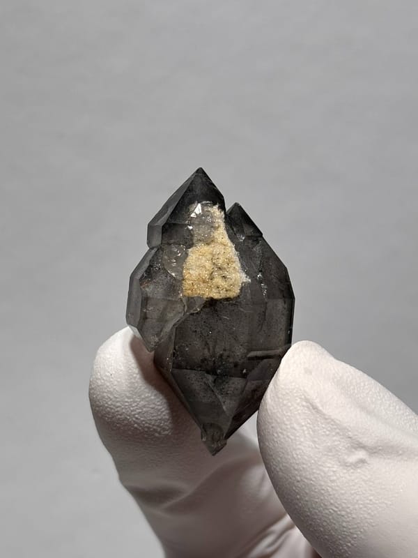 Black double-terminated quartz pair from Yunnan, China, reverse side