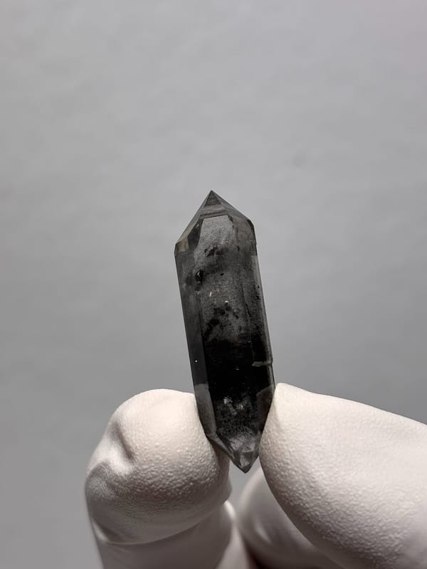Black double-terminated quartz with clear rim from Yunnan, China, reverse side