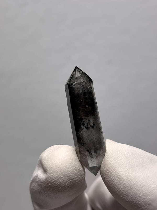 Black double-terminated quartz with clear rim from Yunnan, China, top view