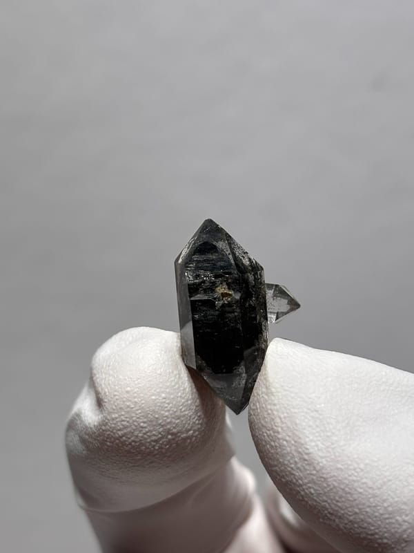 Tiny black double-terminated quartz with side crystal from Yunnan, China, second angle