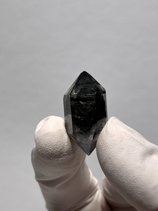 Stout black double-terminated quartz from Yunnan, China, reverse side