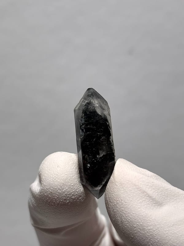 Tiny black double-terminated quartz with clear rim from Yunnan, China, second angle