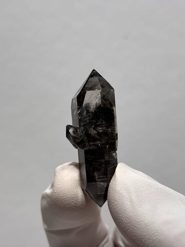 Black double-terminated quartz with golden flecks from Yunnan, China, second angle