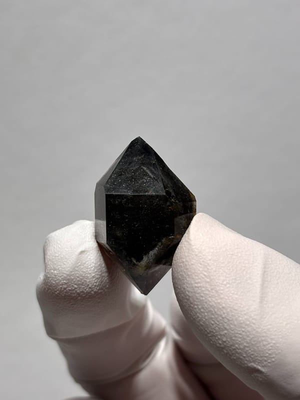 Black sparkly quartz with self-healed tip from Yunnan, China, second angle