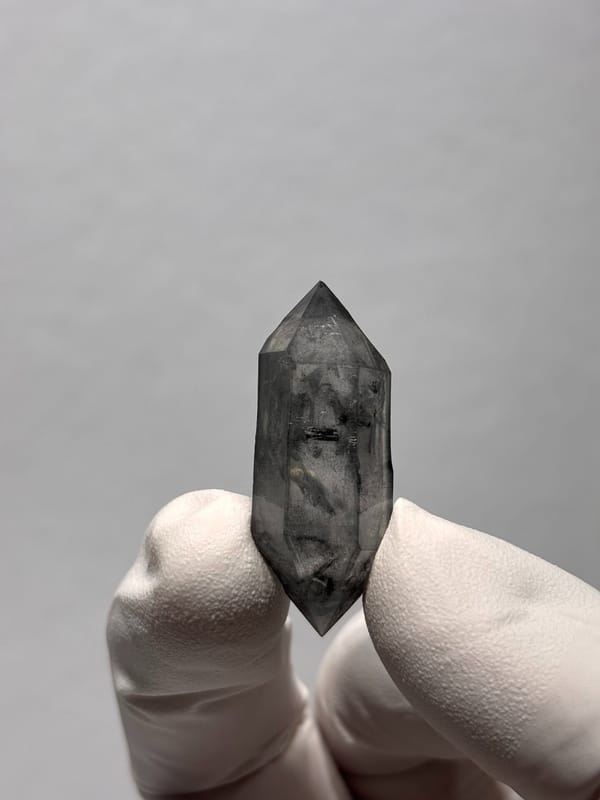 Stout black sketch-pattern double-terminated quartz from Yunnan, China, close-up of the crystal faces