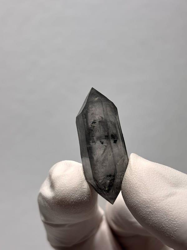 Stout black sketch-pattern double-terminated quartz from Yunnan, China, reverse side