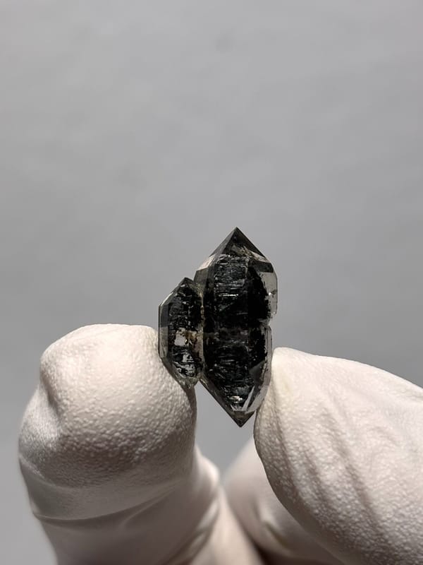 Tiny black sugar-core quartz with side crystal from Yunnan, China, reverse side