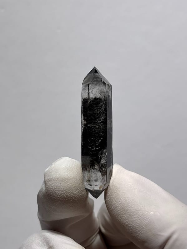 Black sugar-core double-terminated quartz from Yunnan, China, reverse side