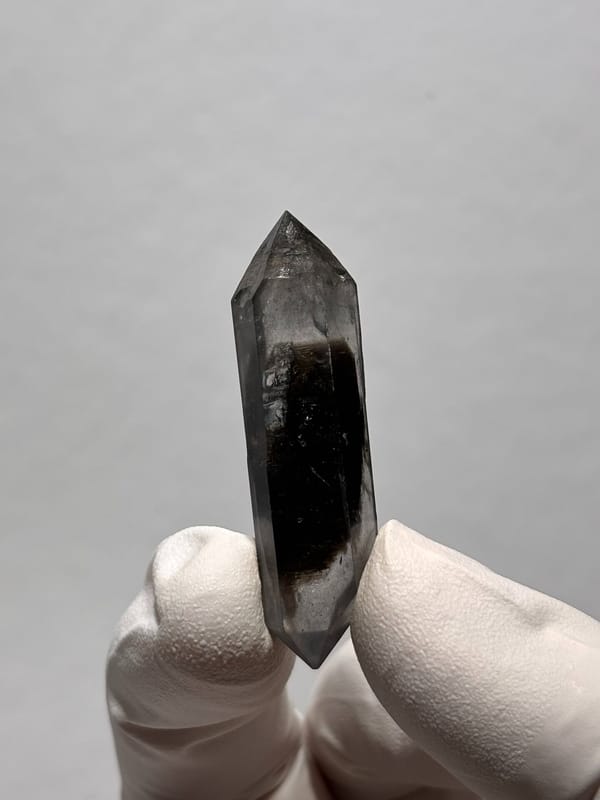 Slender black sugar-core double-terminated quartz from Yunnan, China, second angle