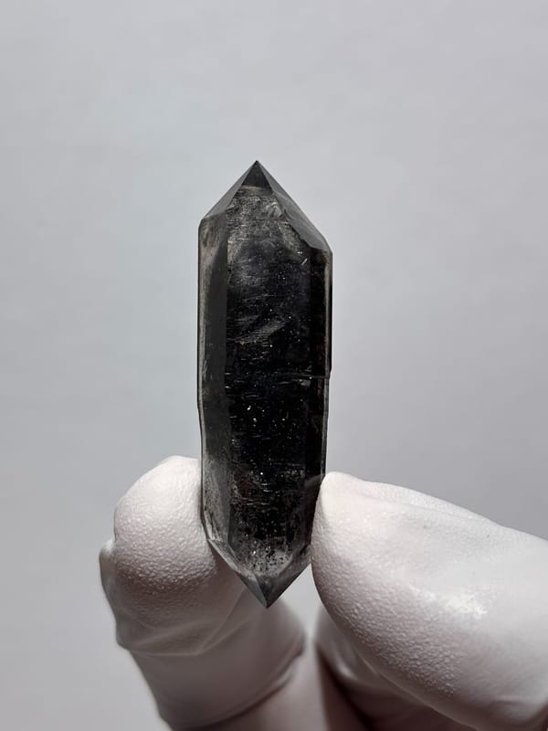Black sugar-core double-terminated quartz from Yunnan, China, reverse side