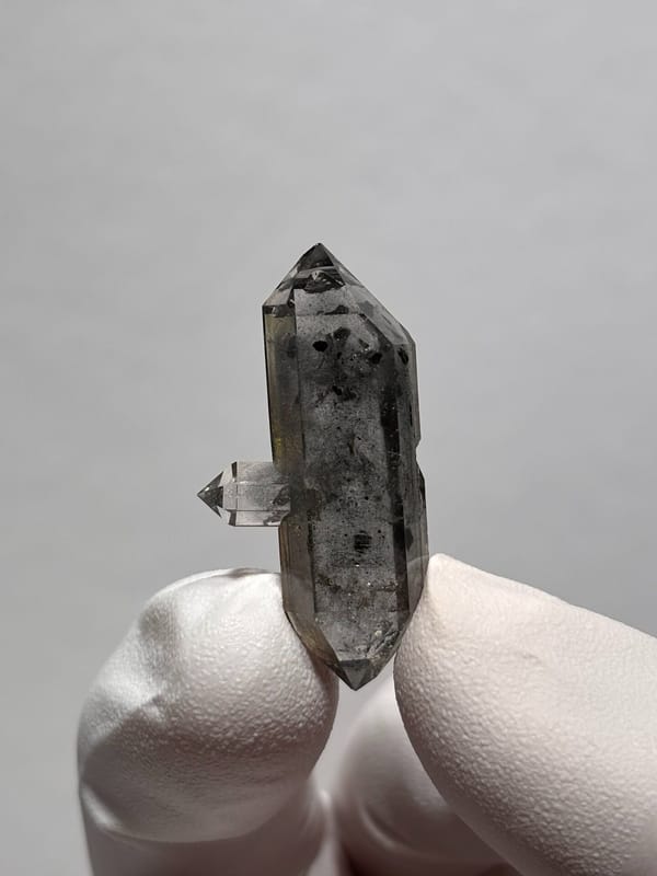 Black-flecked double-terminated quartz with side crystal from Yunnan, China, second angle