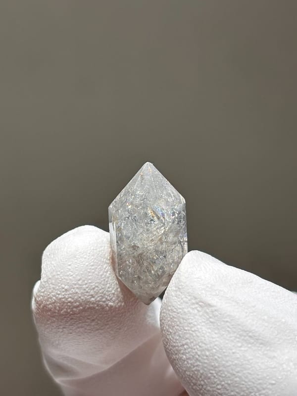 Tiny burst-crystal double-terminated quartz with sparkles from Yunnan, China, second angle