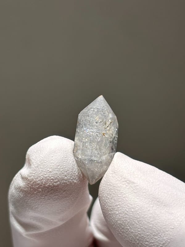 Tiny burst-crystal double-terminated quartz with sparkles from Yunnan, China, top view