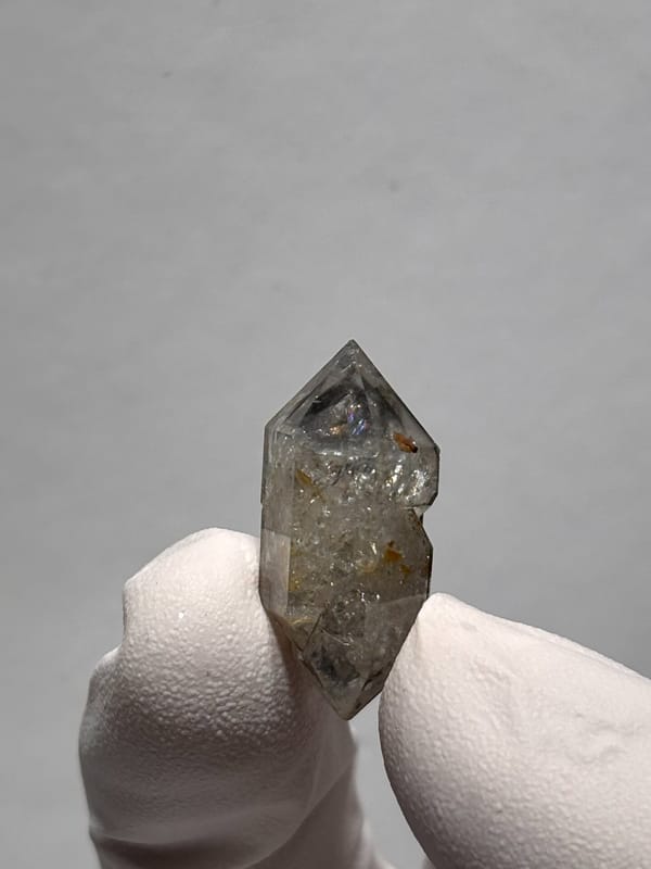 Tiny burst-crystal double-terminated quartz with golden flecks from Yunnan, China, second angle