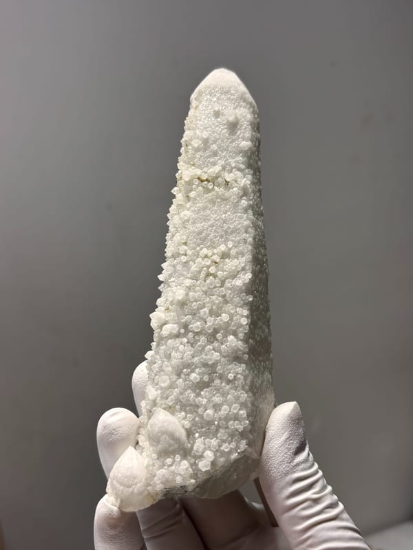 White candle quartz tower from Inner Mongolia, China, close-up of the crystal faces