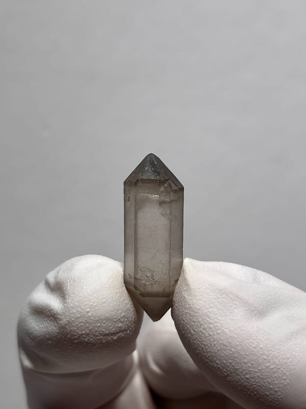 Tiny smoky capped double-terminated quartz from Yunnan, China, second angle