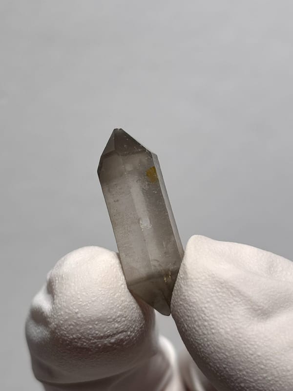 Tiny smoky capped double-terminated quartz from Yunnan, China, reverse side