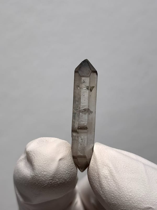 Needle-thin capped double-terminated quartz from Yunnan, China, reverse side