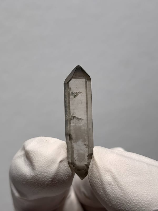 Needle-thin capped double-terminated quartz from Yunnan, China, top view