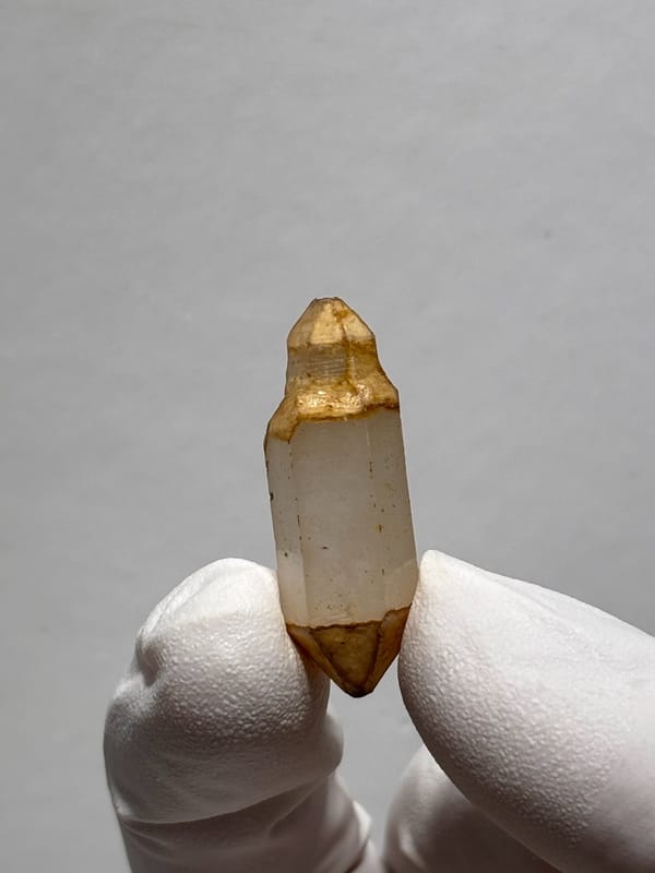 Orange-capped double-terminated quartz with flowered tips from Yunnan, China, reverse side