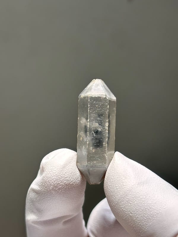 Capped double-terminated quartz with grey phantom from Yunnan, China, close-up of the crystal faces