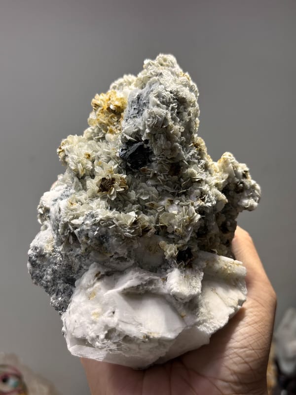 Dark mica block with aquamarine, cassiterite and scheelite from Xuebaoding, Sichuan, China, second angle