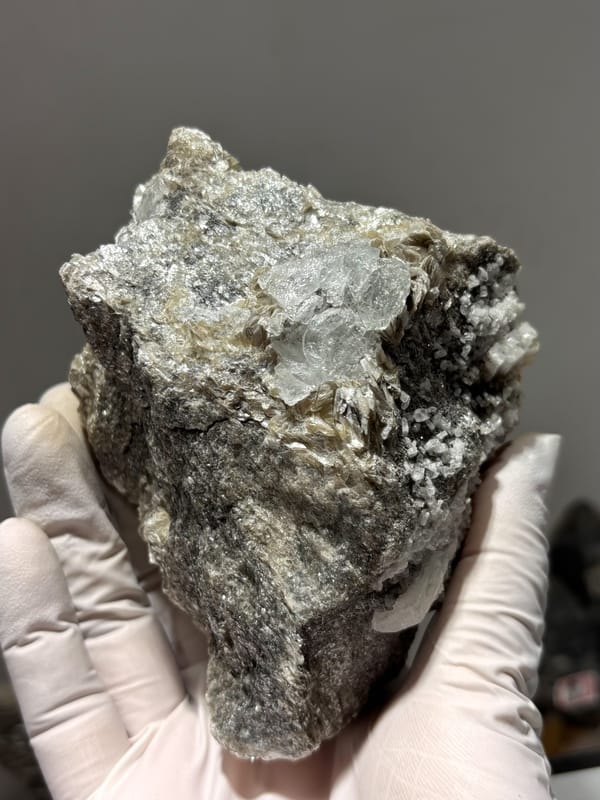 Free-standing mica block with pale blue aquamarine from Xuebaoding, Sichuan, China, reverse side