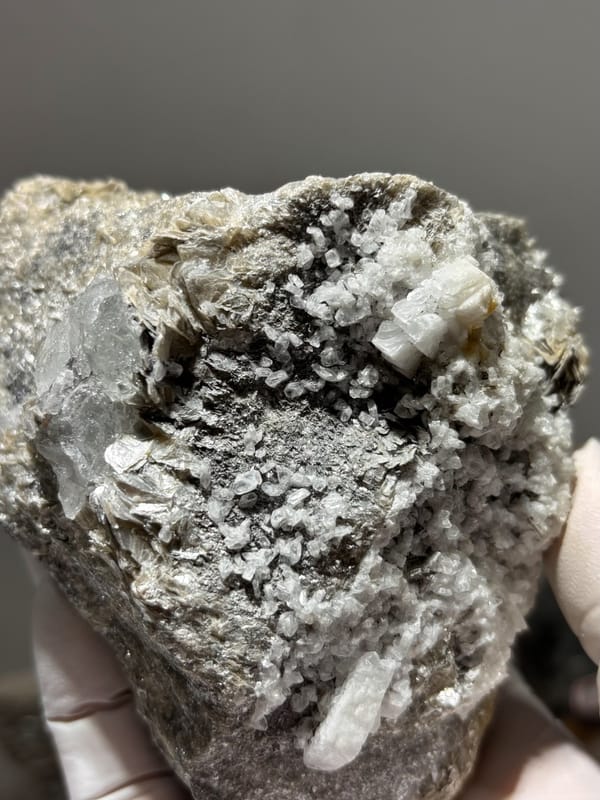 Free-standing mica block with pale blue aquamarine from Xuebaoding, Sichuan, China, top view
