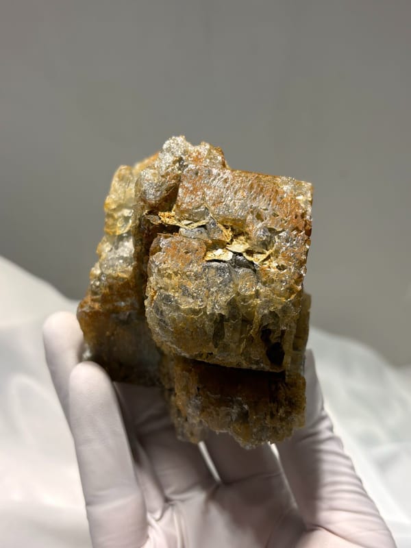 Aquamarine block with rusty matrix from Xuebaoding, Sichuan, China, reverse side