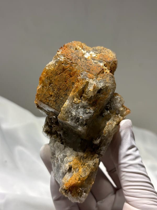 Aquamarine block with rusty matrix from Xuebaoding, Sichuan, China, detail of the matrix contact
