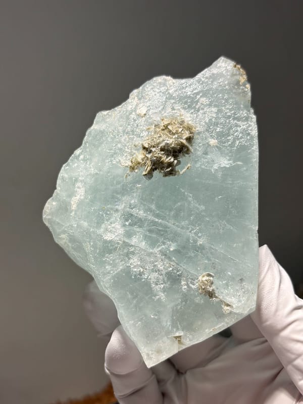 Aquamarine plate with mica rosette from Xuebaoding, Sichuan, China, second angle