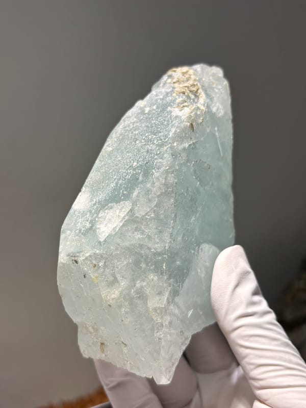 Aquamarine plate with mica rosette from Xuebaoding, Sichuan, China, close-up of the crystal faces
