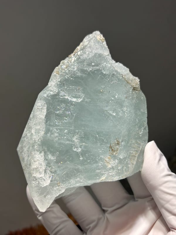 Aquamarine plate with mica rosette from Xuebaoding, Sichuan, China, reverse side