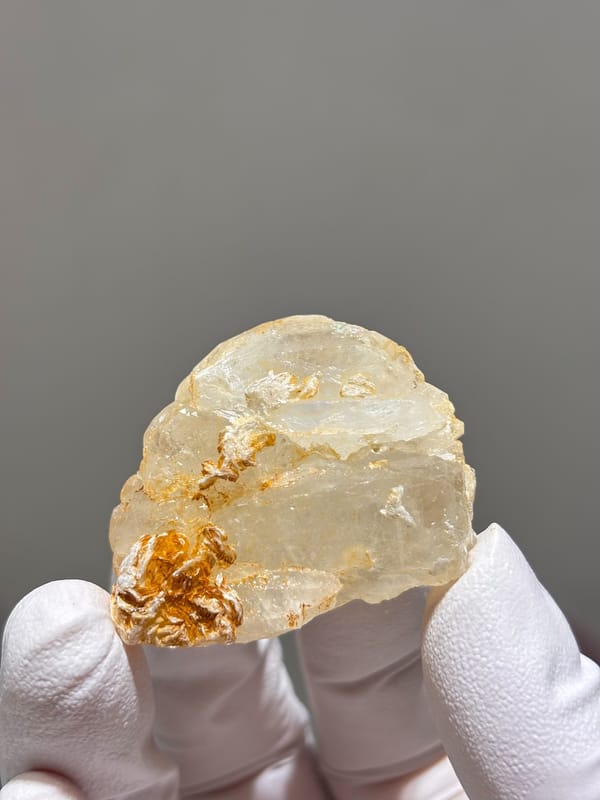 Clear aquamarine with mica and fluorite from Xuebaoding, Sichuan, China, second angle