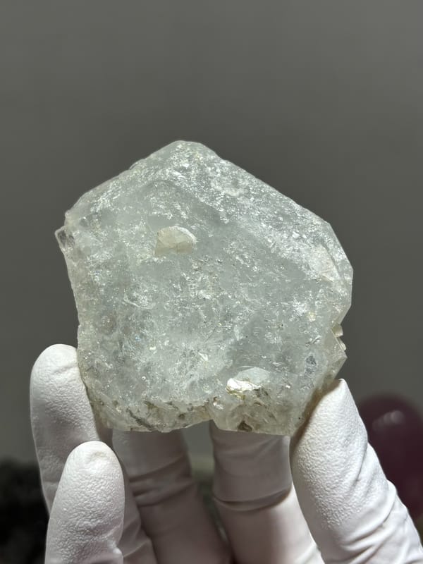 Complete pale aquamarine crystal with frosted faces from Xuebaoding, Sichuan, China, reverse side